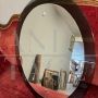 Vintage 1970s oval mirror with green glass frame