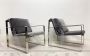 Minimalist design armchairs in metal and dark gray fabric