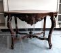 Antique carved biscuit table in walnut from the early 19th century  