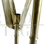 Pair of floor lamps with polished brass leaves