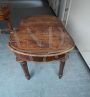 Antique extendable table with oval top