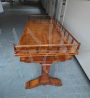 Antique desk in light mahogany with railing on the top