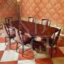 Living room set by Osvaldo Borsani with table and chairs in mahogany and rosewood