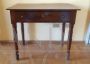 Antique walnut coffee table from the mid-19th century with turned legs