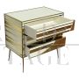 Three-drawer dresser with white and gold glass geometries