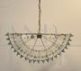 Horizontal chandelier in Murano glass and brass