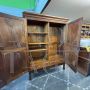 Large antique wardrobe from the early 19th century in walnut with diamond carved doors