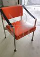 Vintage design armchair in steel and orange skai, 1970s           