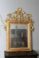 Antique mirror from the mid-18th century, carved and gilded with pure gold