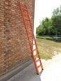 Vintage ladder in orange lacquered wood with a height of 3 meters                   
                            