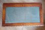 Antique inlaid coffee table with light blue velvet top