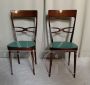 Pair of Melchiorre Bega chairs in green skai leather, 1950s