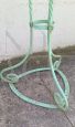 Pair of vertical Art Nouveau plant stands in green lacquered iron