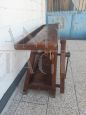 Antique carpenter's bench table from the early 19th century in oak with vice