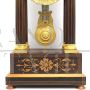 Antique Charles X pendulum clock in inlaid rosewood, 1800