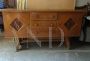 Pair of 1950s sideboards with carvings