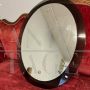 Vintage 1970s oval mirror with green glass frame