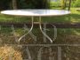 Shine oval table by Vico Magistretti for De Padova