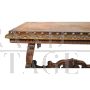 Antique carved desk table with studded leather top