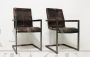 Pair of vintage style cantilever chairs in brown leather