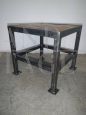 Black lacquered industrial stool from the 1980s