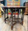 Antique drop-leaf Pembroke table with turned legs, 1910s - 1920s             