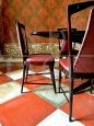 Living room set by Osvaldo Borsani with table and chairs in mahogany and rosewood