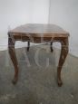 Vintage coffee table with wavy and carved legs