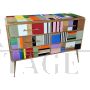 Design dresser with six drawers covered in multicolored glass