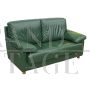 Vintage style sofa in green leather