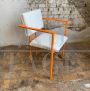 Pair of orange postmodern armchairs with white bouclé wool fabric