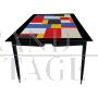 Design table in wood and multicolored glass