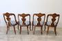 Set of four antique gondola chairs in carved walnut