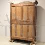 Antique Louis XV wardrobe or cupboard in walnut and cherry with carvings, 18th century