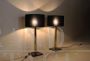 Pair of modern design lamps in brass and black marble