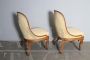 Antique pair of Charles X armchairs in walnut with cream damask fabric