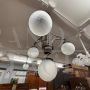 Art Nouveau chandelier in wrought iron and brass with glass spheres, 1930s