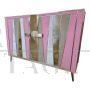 Two-door sideboard with pink glass and brass geometries