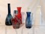 Set of 8 decorative vintage bottles from the 70s