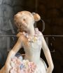 Vintage porcelain sculpture, little girl with a basket of flowers