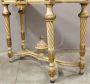 Antique Louis XVI console from the 19th century, carved, lacquered and gilded