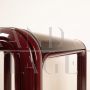 Orsay 54A table by Gae Aulenti for Knoll with glass top, burgundy color