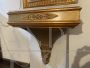 Small antique console table from the Empire period in gilded wood with mirror