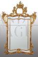 Large antique Louis Philippe mirror in gilded and carved wood 