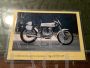 Metal bookcase with 60s Ducati motorcycle