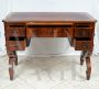 Antique Louis Philippe desk in mahogany feather with leather top