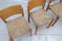 Set of 4 vintage wooden dining chairs with straw seats, 1970s