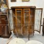 1940s art deco rounded display cabinet in inlaid oak with beveled glasses