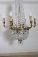 Antique chandelier from the late 19th century in gilded bronze with crystal drops