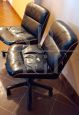 Vintage black leather office armchairs